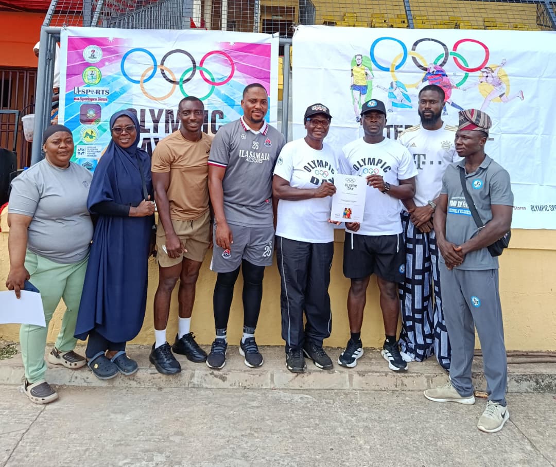 Coach Korede and fitness stakeholders at an Olympic Day programme