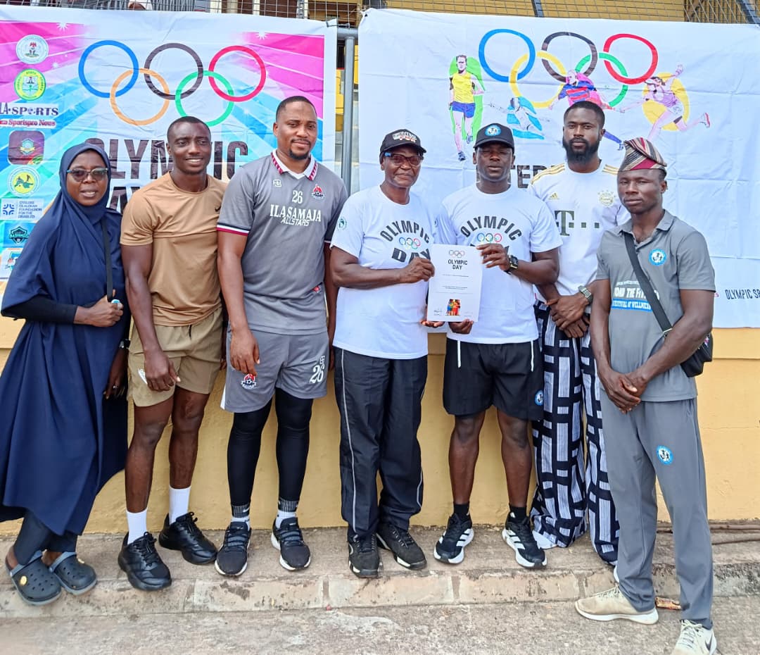 Coach Korede with participants at an Olympic Day event